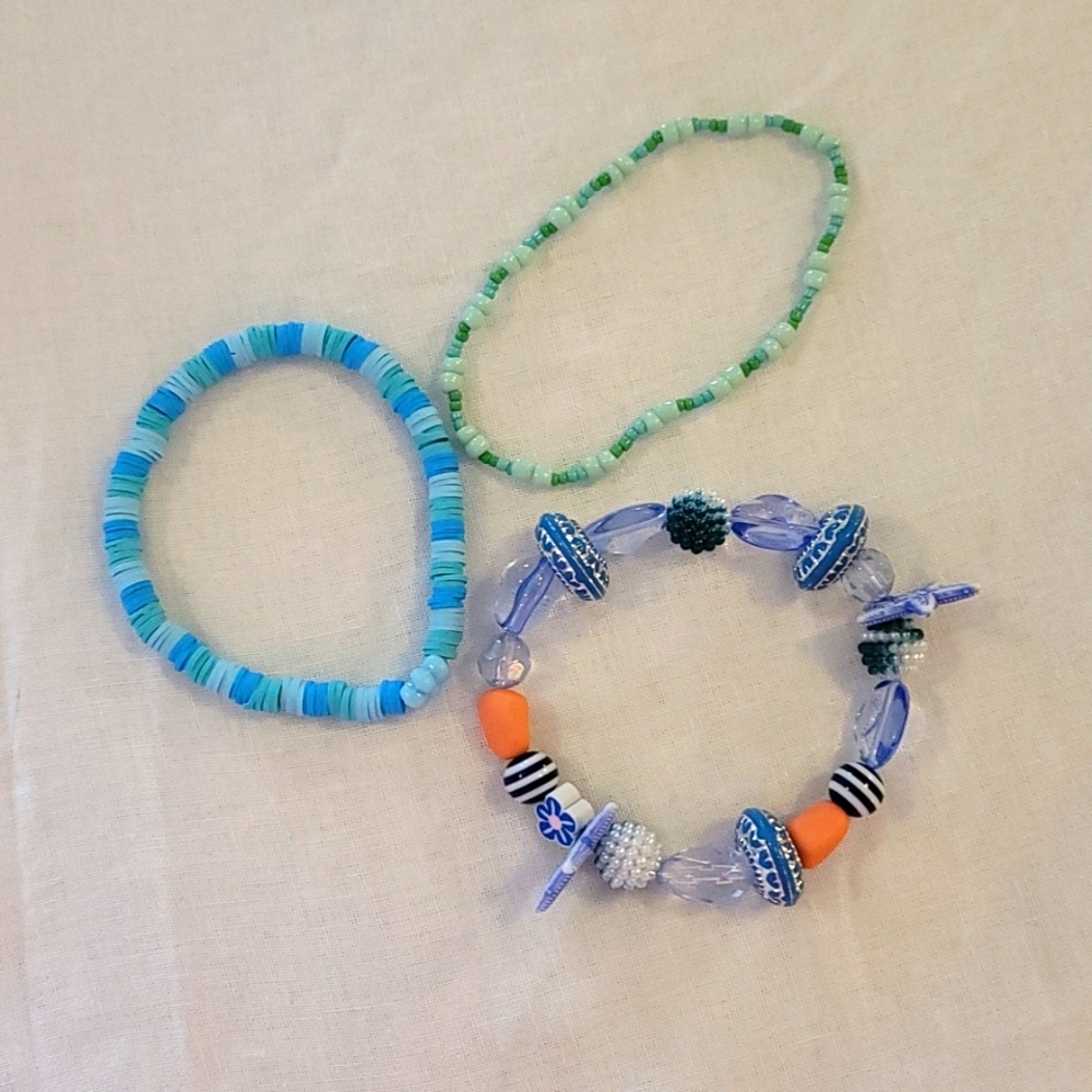 Set of 3 beaded stretch bracelets.